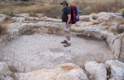 Don standing on a mosaic at Nevallat ruins near Rt. 6